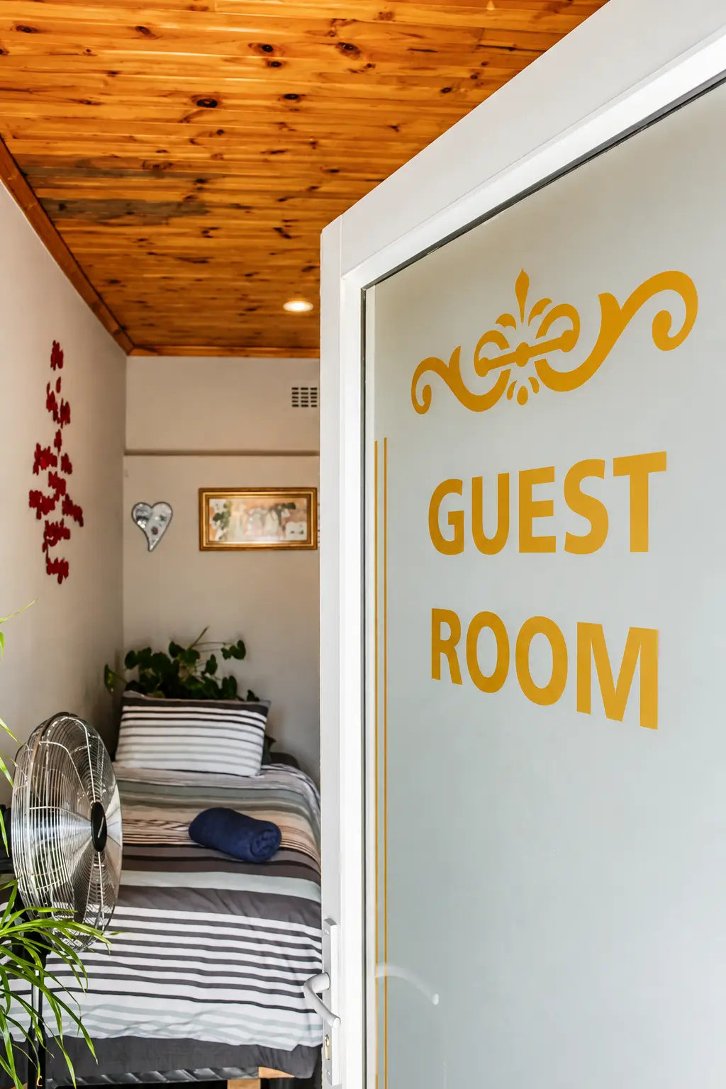 Aloe Guest Room entrance door