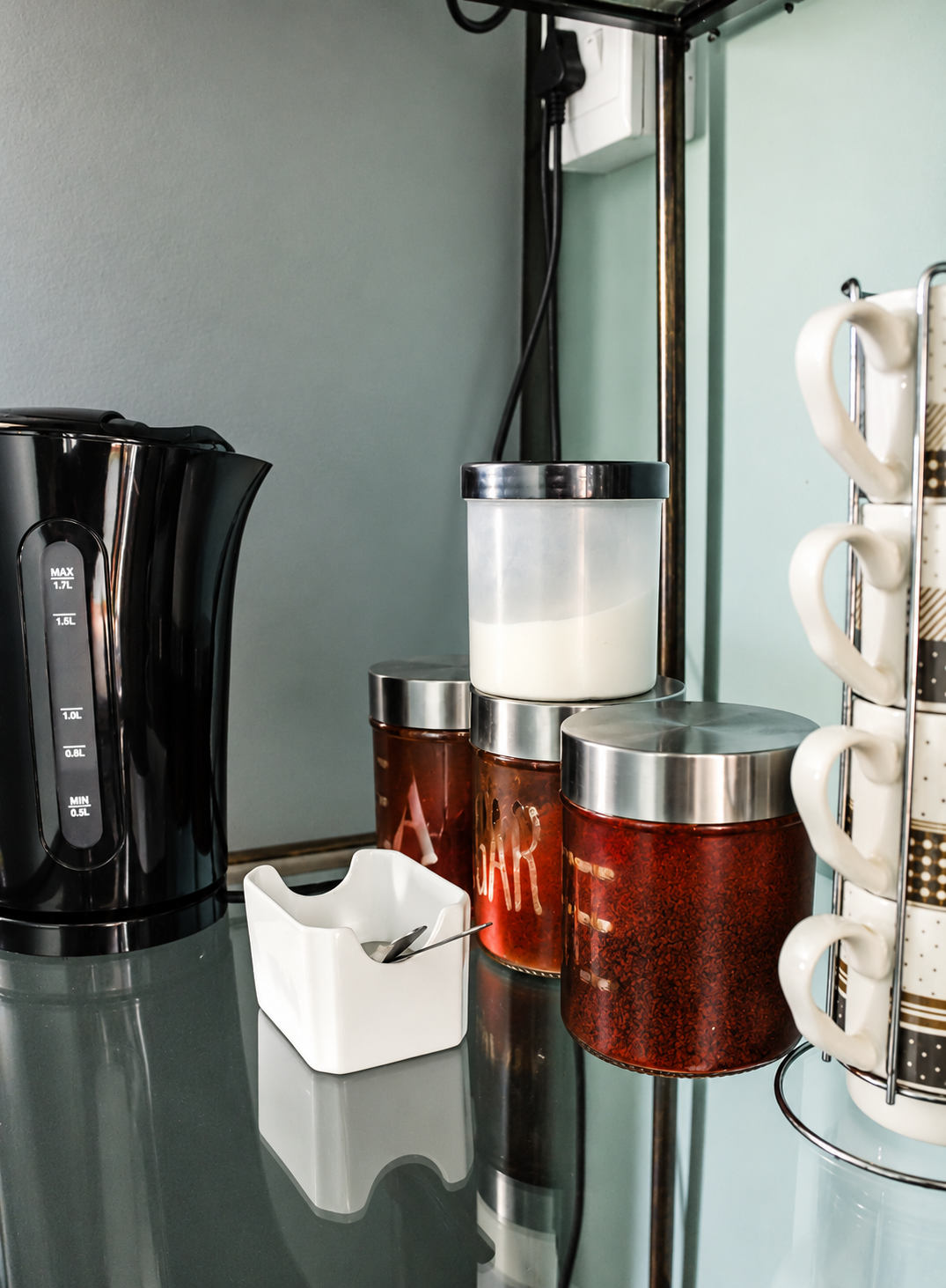 Tea and coffee station with kettle and canisters in the Sunflower room