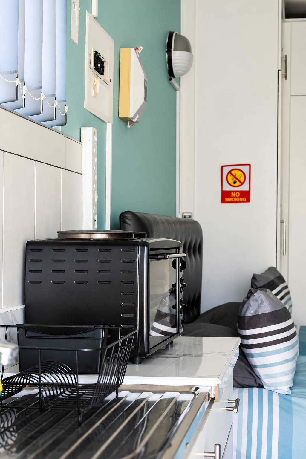Sunflower room kitchenette with mini oven and sink